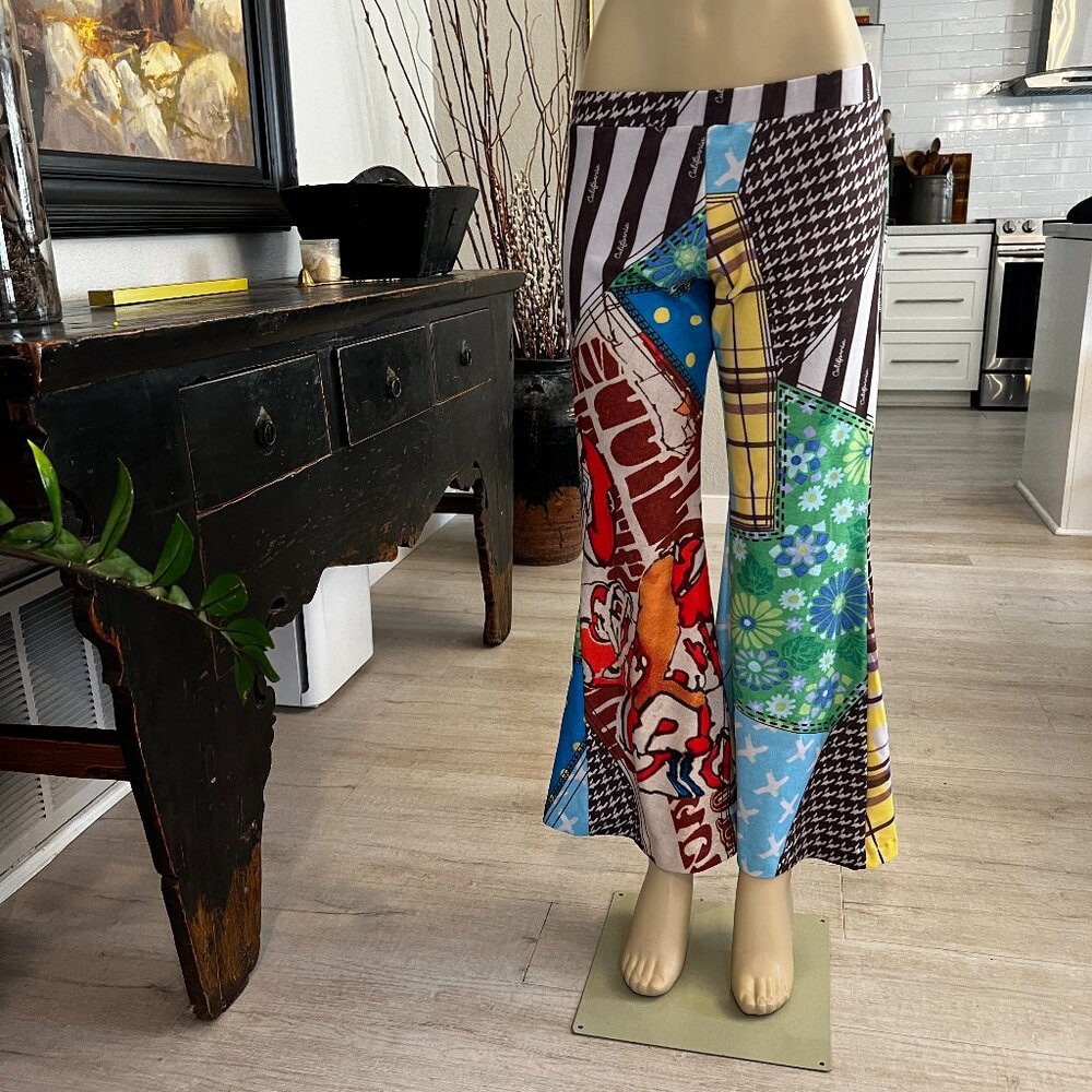 ERL The EMILIO flared leg hip hugging graphic designed stretchy pants